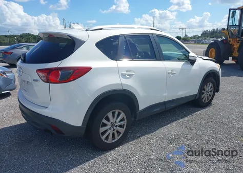 2015 Mazda Cx-5 Touring z USA, uszkodzony, nr VIN JM3KE2CY3F0511208